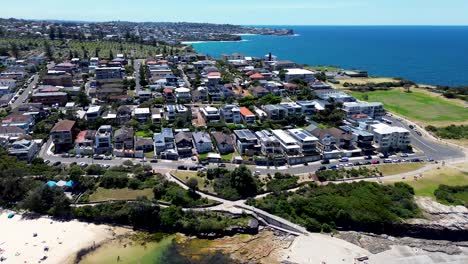Drone-aerial-scenic-view-housing-development-residential-infrastructure-units-apartments-street-roads-Clovelly-Bay-beach-Randwick-Coogee-NSW-travel-tourism-Australia-4K-Eastern-Suburbs