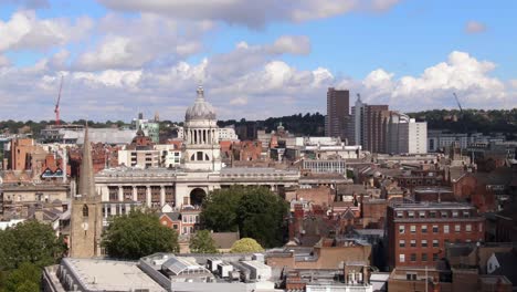 Low-angle-drone-footage-of-Nottingham-city-centre-in-England-on-a-sunny-day
