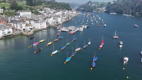 Colourful-sailboats-moored-Fowey-Cornwall-UK-drone,aerial