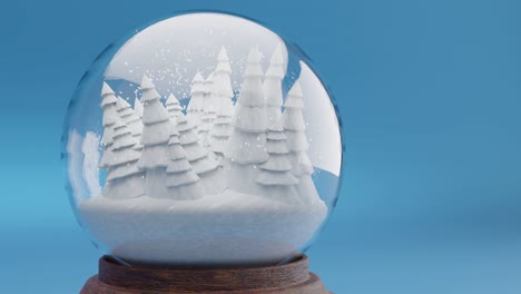 Bosque-De-Invierno-Encantado-Dentro-De-Una-Bola-De-Nieve-Sobre-Fondo-Azul