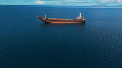 Aerial-Fly-By-of-Mining-Barge-in-the-ocean-Bay-of-the-Philippines