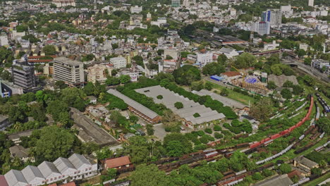 Colombo-Sri-Lanka-Aerial-v10-drone-flyover-Pettah-and-Area-10-capturing-major-rail-hub-Maradana-Railway-Station-from-above,-residential-and-industrial-cityscape---Shot-with-Mavic-3-Cine---April-2023