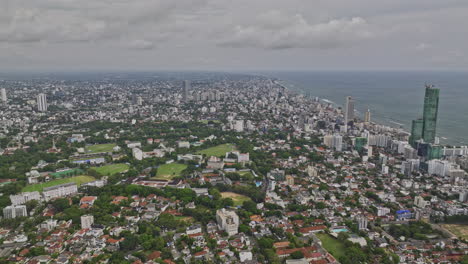 Colombo-Sri-Lanka-Aerial-v20-high-altitude-drone-flyover-Cinnamon-Gardens-capturing-waterfront-cityscape-of-coastal-neighborhoods,-Kollupitiya-and-Bambalapitiya---Shot-with-Mavic-3-Cine---April-2023