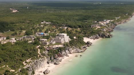aerial-close-up-of-ancient-Maya-ruins-in-Tulum-Mexico-drone-above-Caribbean-Sea-ocean