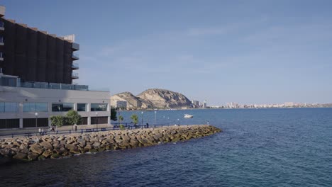 Postiguet-beach-breakwater-with-coast-views-in-Alicante,-Costa-Blanca,-Spain,-Mediterranean