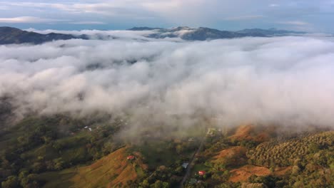 Scenic-Green-Costa-Rica-Jungle-With-Cloud-Cover-And-Blue-Sky,-4K-Drone-Flyover