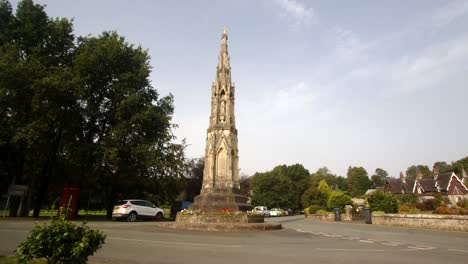 wide-shot-of-a-stone-monument,-park-cross