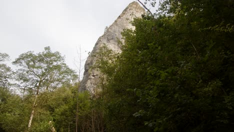 Shot-of-Ilam-rock-with-trees-in-foreground-at-dovedale