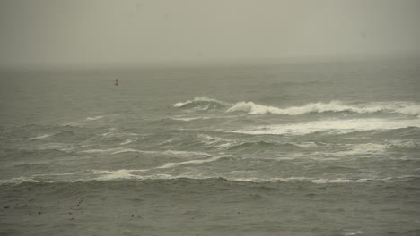 waves-crash-amid-rough-ocean-conditions
