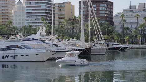 Boat-arriving-at-nautic-port-at-Alicante,-Costa-Blanca,-Spain,-Mediterranean