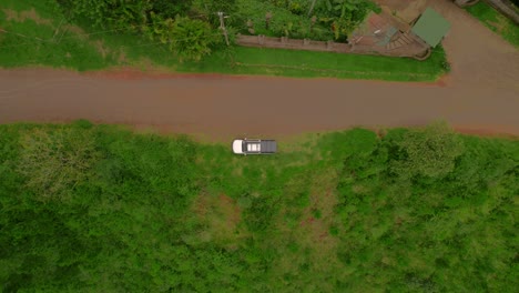 Top-view-of-an-off-road-vehicle-parked-by-the-roadside,-Costa-Rica