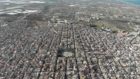 Wide-view-of-Pachino-city-in-Sicily-during-day-time,-aerial