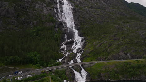 Scenic-Langfoss-waterfall-cascading-down-rocky-mountainside