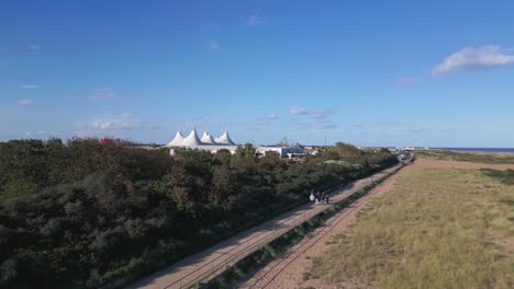 Aerial-drone-footage-of-the-famous-Butllins-holiday-camp-based-in-the-seaside-town-of-Skegness-Lancashire,-UK