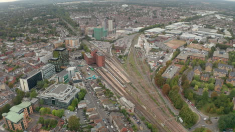 Wide-circling-aerial-shot-of-Watford-Junction-train-station