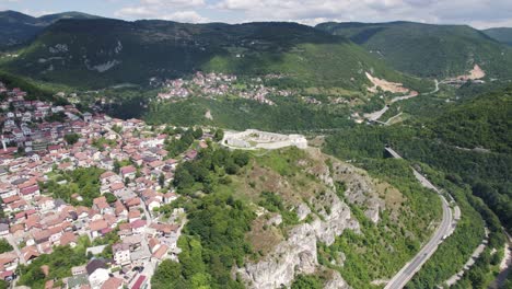 Aerial:-White-Fortress-atop-Sarajevo's-green-hills,-Bosnia-and-Herzegovina