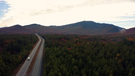 Aerial-Flyover-Of-Cars-Travelling-Through-Franconia-Notch-State-Park-On-Interstate-93