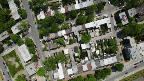 Birds-eye-drone-shot-over-the-Petite-Bourgogne-neighborhood,-in-Montreal