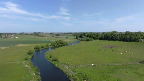 A-Scenic-View-of-Greenery-and-Kävlinge-River-in-Sweden---Drone-Flying-Forward