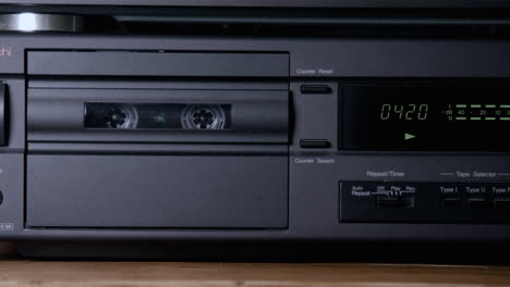 Footage-of-a-vintage-tape-deck-or-cassette-player-with-a-tape-counter