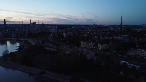 Deep-blue-light-evening-waterfront-aerial-over-quiet-Helsinki-Finland