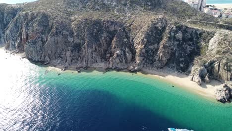 Amazingly-blue-waters-by-the-cliffs-at-El-Balconcito,-Cabo-San-Lucas