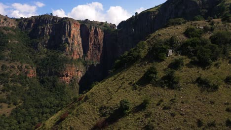 Aerial-shots-of-a-mountain-and-waterfall-in-Mpumalanga,-South-Africa