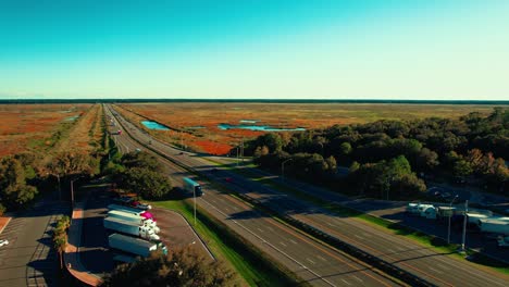 Concept-aerial-footage-of-trucking-logistics-business-on-a-highway