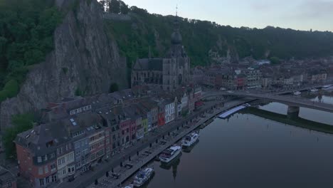 Dolly-shot-of-Citadel-of-Dinant-during-sunrise,-aerial