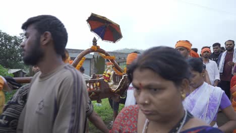 The-crowd-of-Hindu-devotees-and-priests-carrying-the-statue-of-Trimbkeshwar-god-palanquin-dedicated-to-Lord-Shiva