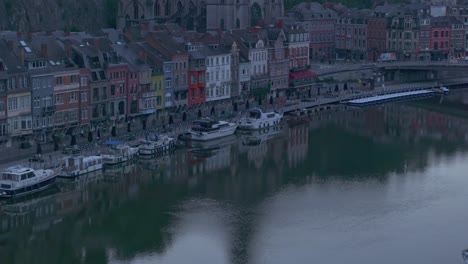 Zoomed-in-shot-of-famous-Citadel-of-Dinant-during-sunrise,-aerial