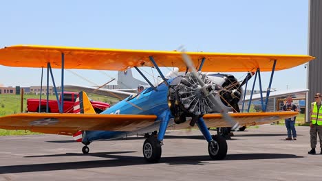 Boeing-Stearman-Model-75-vintage-world-war-II-training-aircraft-starting-up-at-an-airshow-at-the-Centennial-Airport-in-Colorado