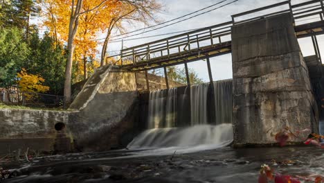 Time-Lapse-Of-Alton-Mill-Waterfall-Flowing-During-Fall-In-Ontario