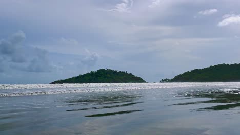 Sea-waves-splashing-on-sandy-shore-of-Palolem-Beach-Goa-India-4K