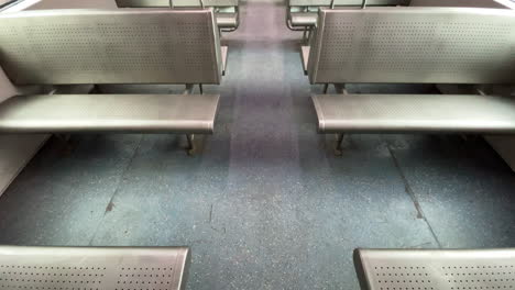 Tilt-Up-shot-of-empty-Mumbai-local-AC-train-India-4K