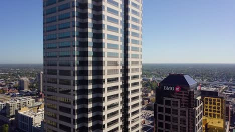 Aerial-rising-shot-of-the-Salesforce-and-BMO-headquarters-in-downtown-Indianapolis