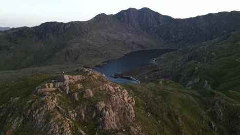 Aerial-of-Llyn-Llydaw-Mount-Snowdon-Wales-with-hikers-on-mountain-top