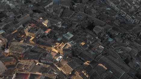 Top-down-view-of-old-city-Modica-Sicily-at-Italy,-aerial