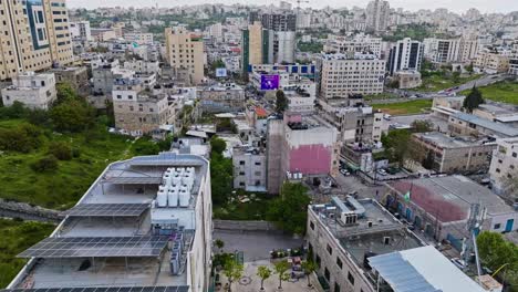 Buildings-And-Structures-In-The-City-Of-Hebron,-Palestine---aerial-shot