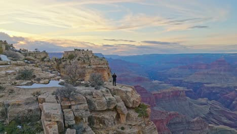 Man-Isolated-Over-Geologic-Rock-Cliffs-In-Grand-Canyon-National-Park,-Arizona,-United-States