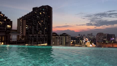 Spectacular-Infinity-Pool-Sunset-in-Luxurious-Malaysian-Travel-Destination,-Melaka---Unforgettable-Tropical-Getaway