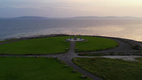 Twilight-hour-flyover-of-public-park-in-Galway-Bay