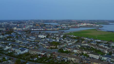 Cinematic-aerial-pan-of-Galway,-featuring-Claddagh-and-River-Corrib