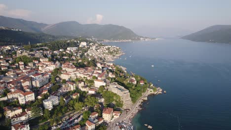 Aerial:-Herceg-Novi,-Montenegro-with-coastal-landscape-and-mountains
