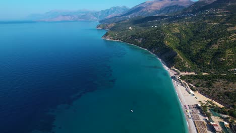 Albanian-Riviera:-A-Beautiful-Coastal-Paradise-with-Turquoise-Seas,-Stunning-Beaches,-Rolling-Hills,-Mountains,-and-Exquisite-Resorts