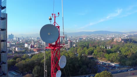 Drone-shot-antenna-in-Mexico-City-broad-day-light-communication-tower