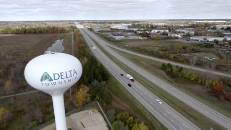 Delta-Township,-Michigan-water-tower-with-drone-video-stable