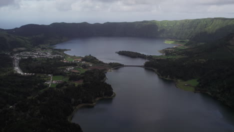 Panoramic-aerial-of-twin-lakes-in-Sete-Cidades,-São-Miguel,-Azores