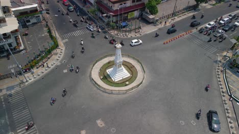 Tugu-Yogyakarta-historical-landmark-roundabout-in-Indonesia,-aerial-orbit
