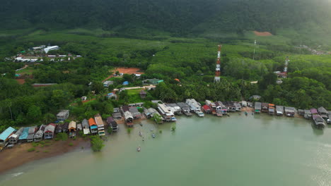 Waterfront-buildings-of-old-town-in-Koh-Lanta,-Thailand,-aerial-view